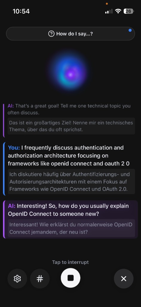 A live AI Talk: captions and translations on screen, How do I say…? at the top, and a stop control when you want the floor.